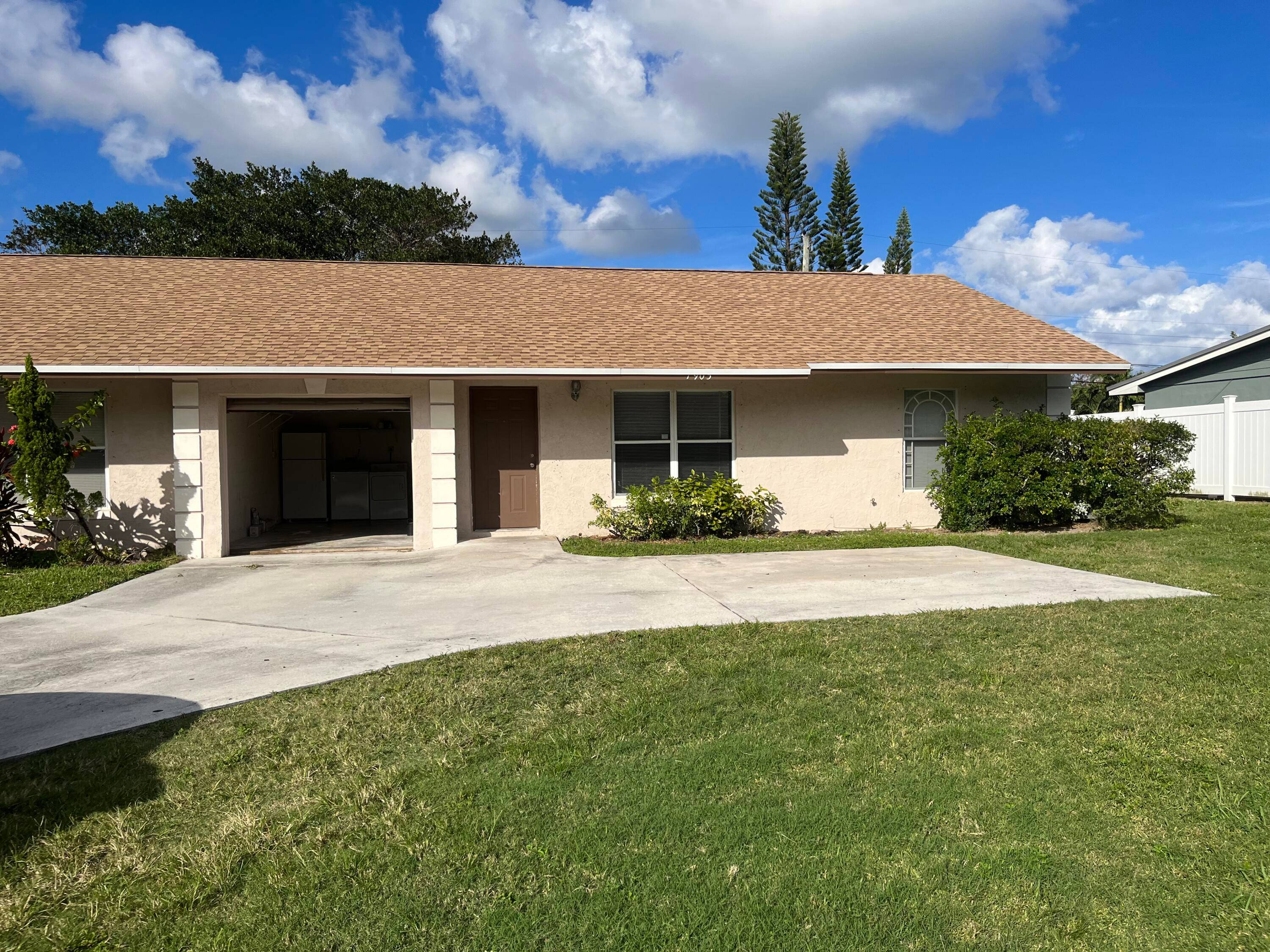Newer CBS duplex featuring 2 units 3 2 and 2 1, plus shed and garage, located just minutes from the beach, shopping, banks, restaurants.