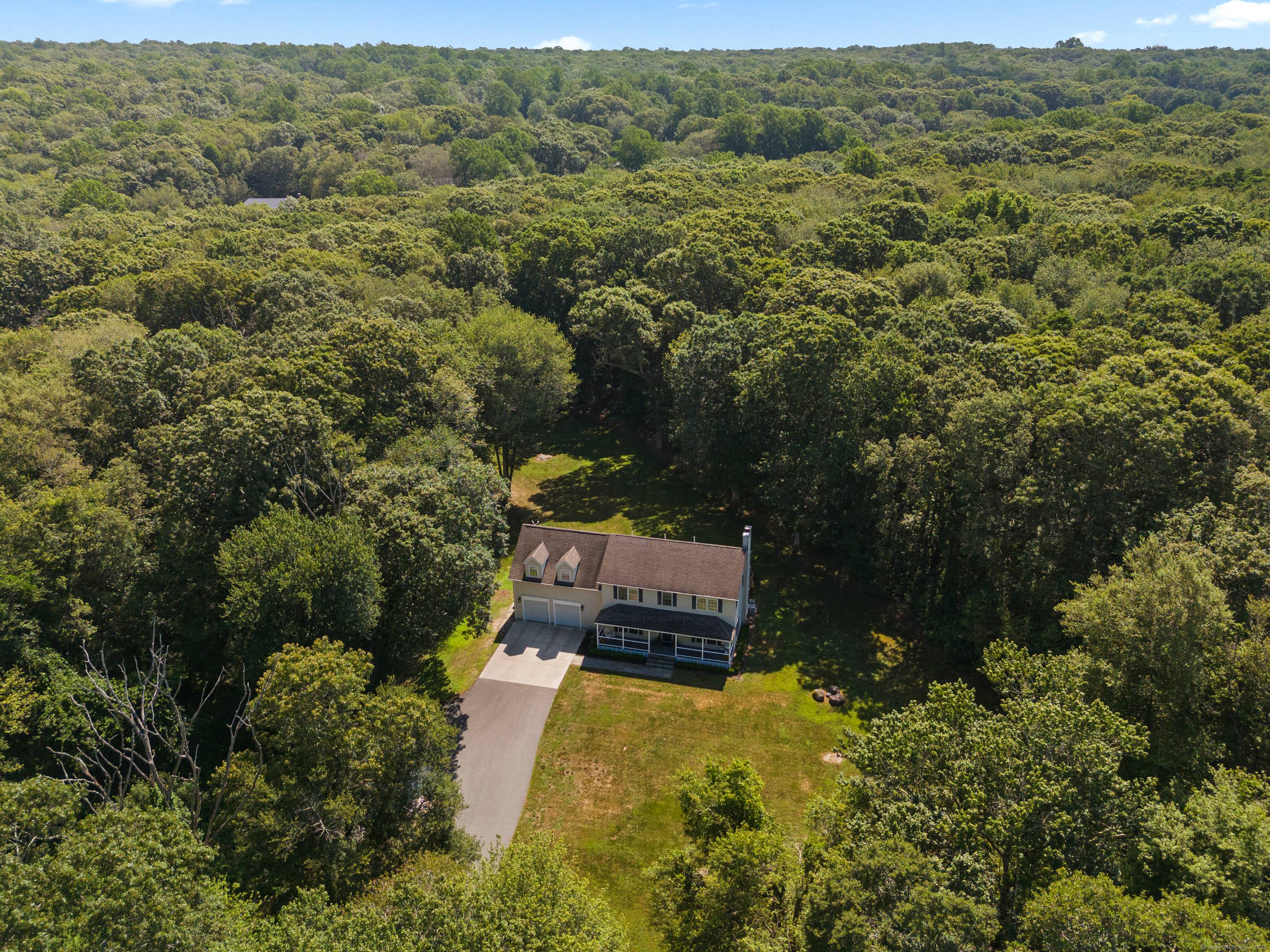 Welcome to 51 2 Rowland. This sun filled, picture perfect colonial in a meadow like setting and framed by woodlands.