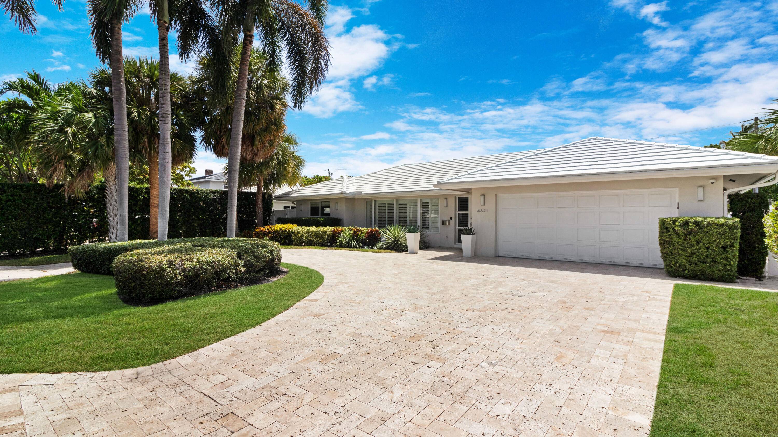Discover the epitome of South Florida living in this beautifully updated 4 bedroom, 2 bathroom home, ideally located just a 5 minute golf cart ride from the sparkling shores of ...