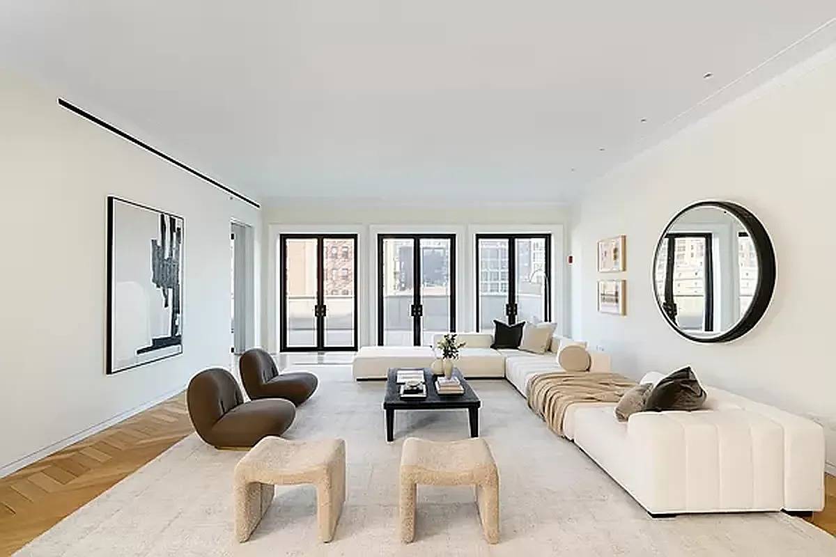 This exceptional duplex penthouse, designed by AD 100 architect Steven Harris, seamlessly blends modern and traditional design across 4, 596 square feet.