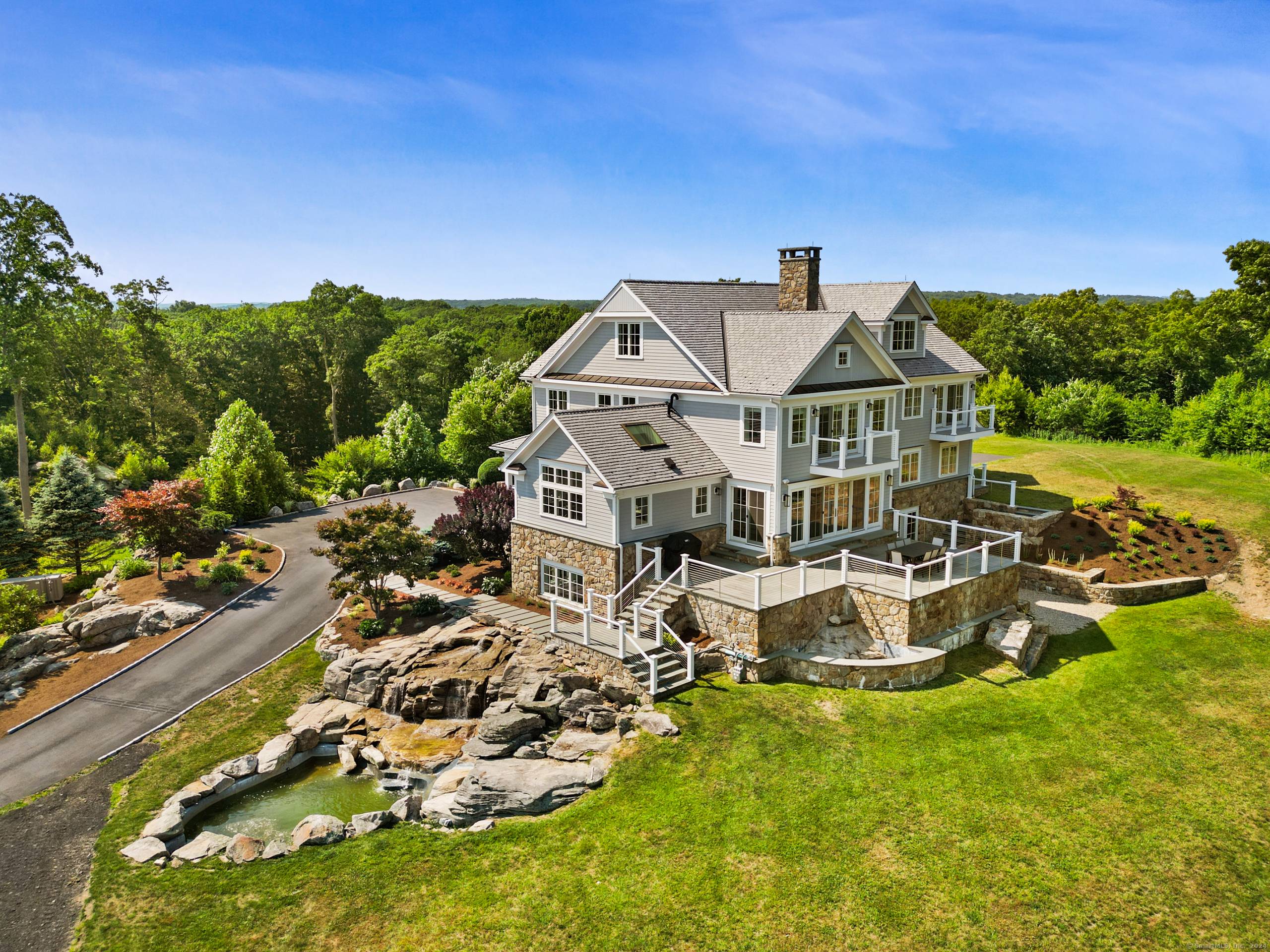 This exquisite custom estate with pool site on 4.