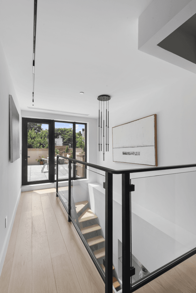 A Rare Light Filled Duplex in the Heart of Greenpoint TH1 at 61 North Henry Street is a luminous, meticulously designed duplex that seamlessly blends architectural elegance with everyday functionality.