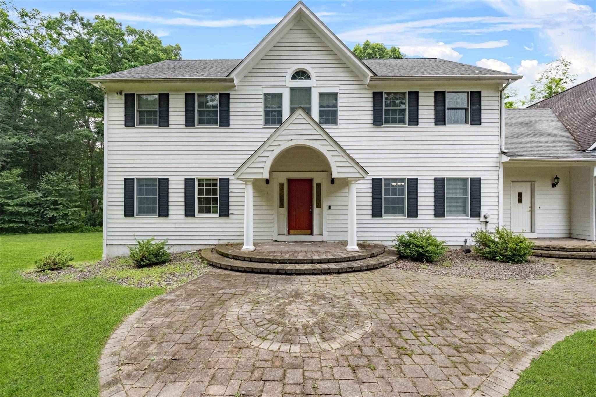 Tucked away on a quiet, private street at the end of a cul de sac, this beautifully maintained Colonial offers the perfect combination of space, privacy, and comfort.