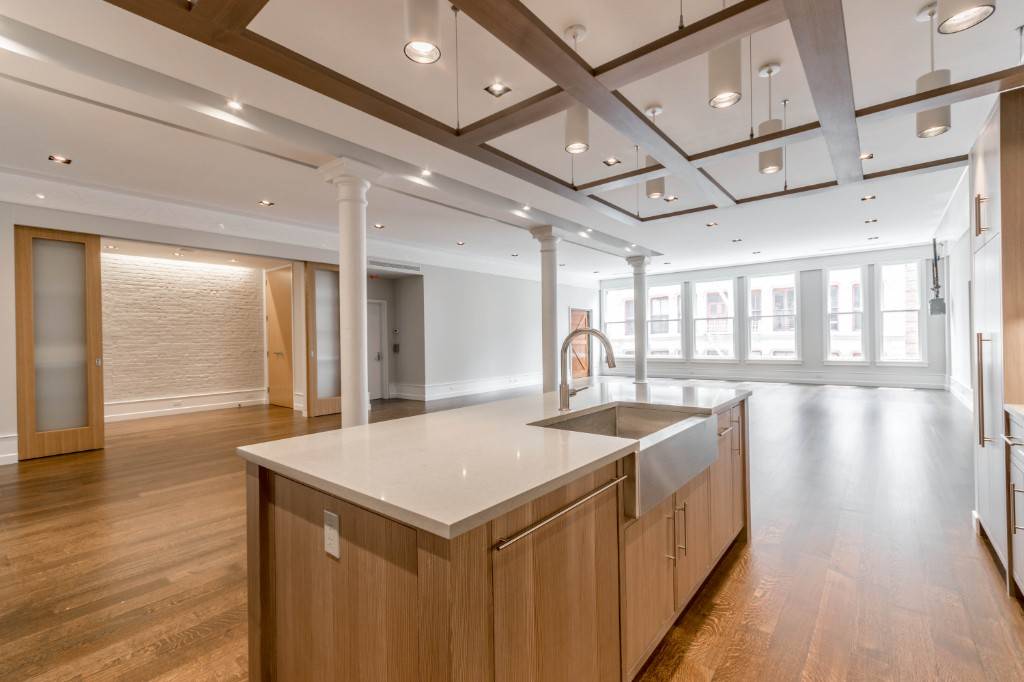 Come home to this 40 wide renovated artists loft with downtown authenticity in the center of prime Soho.