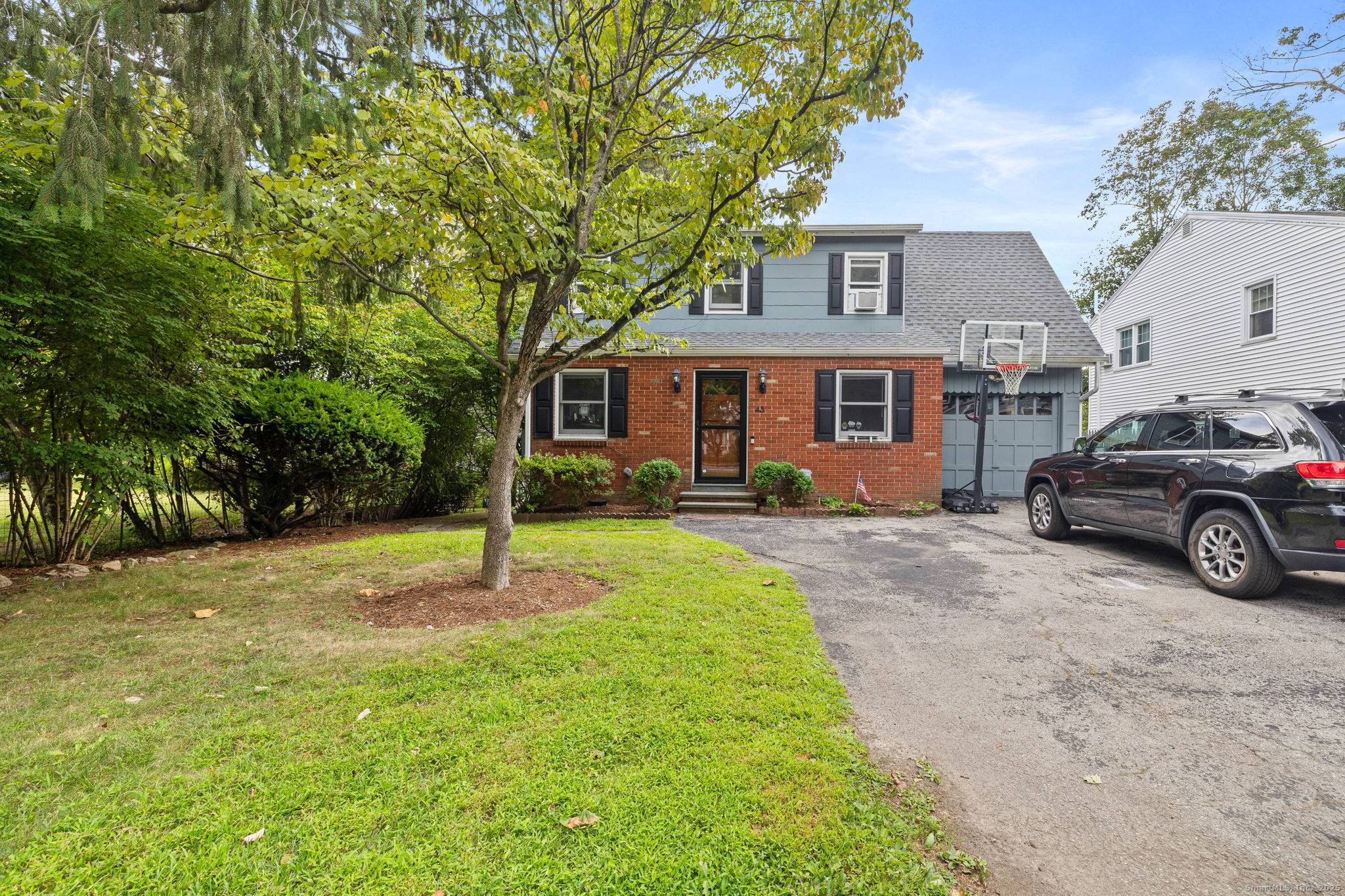 This charming colonial home in Darien offers the perfect blend of classic character and modern updates.