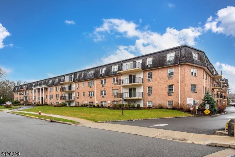 Welcome to this beautifully renovated, one of a kind condominium at The Roxbury, ideally located in the heart of highly desirable Westwood.