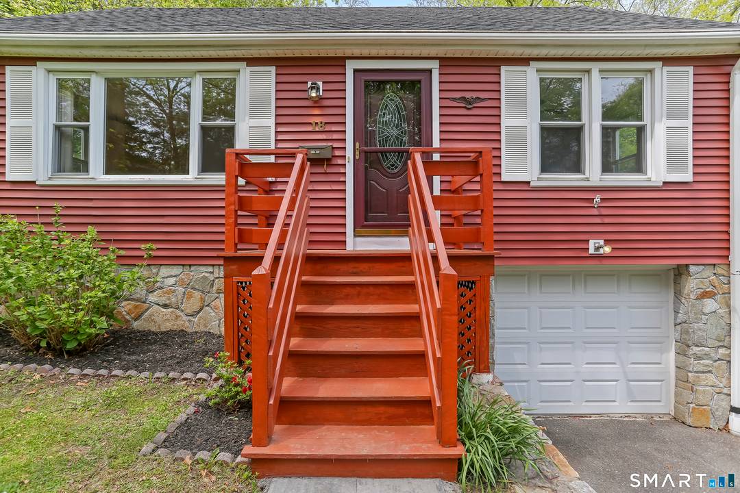 Charming and beautifully maintained Cape set on a level, grassy lot with numerous upgrades and updates throughout.