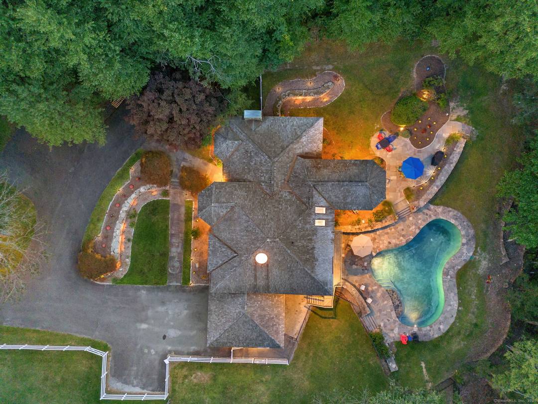 Tucked away in the picturesque hills of Litchfield County, right on the desirable Woodbury Roxbury line, this stunning Colonial Contemporary residence offers an unparalleled blend of privacy, natural beauty, and ...