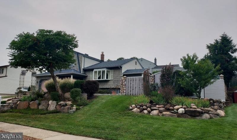 EXCEPTIONAL SPLIT LEVER WITH UPGRADES Welcome to this beautiful, updated Split level style home in a quiet neighborhood in Sayreville.