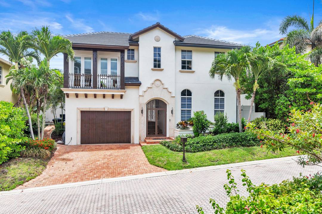 LIVE STEPS FROM THE BEACH in this LUXURIOUS coastal estate in exclusive JUNO BEACH !