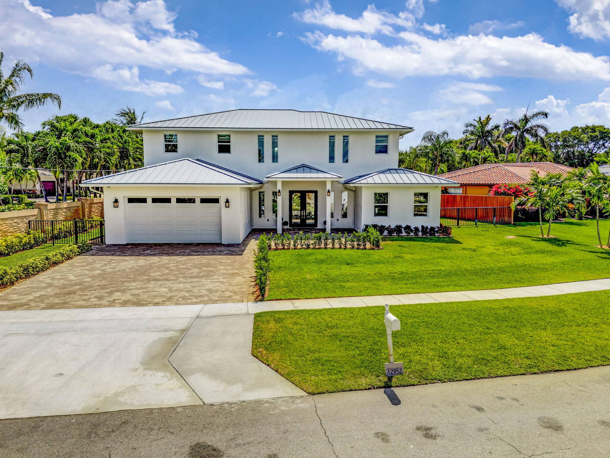 Welcome to this exceptional new construction residence in the highly sought after community of Juno Isles.