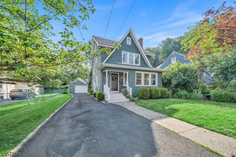 Welcome to this beautifully updated Colonial, nestled on a quiet cul de sac that backs onto the scenic Watchung Reservation in Scotch Plains, NJ.