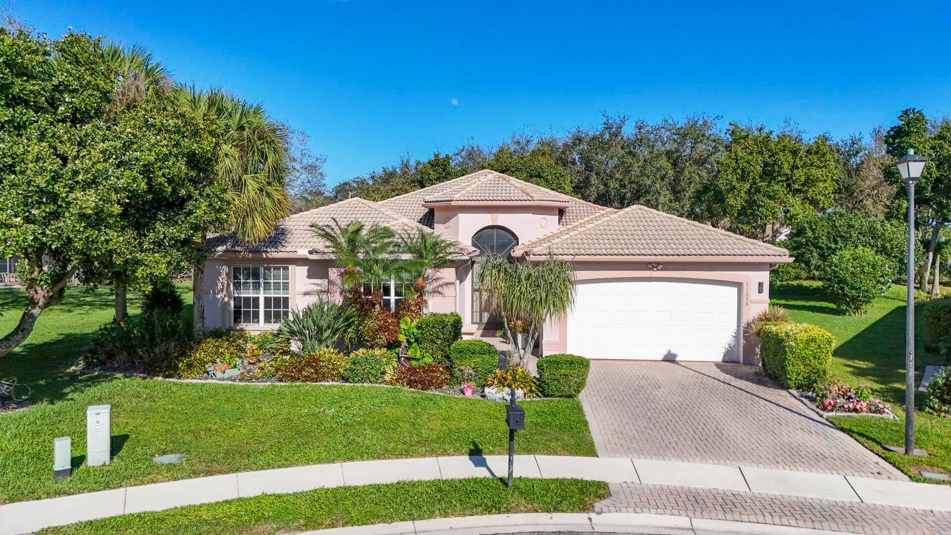 Nestled in a quiet cul de sac, this stunning 4 bedroom, 2.