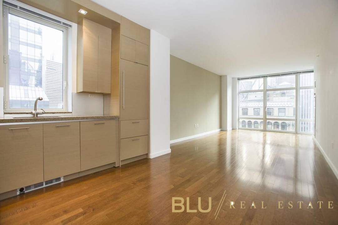This stunning one bedroom with home office could be a small second bedroom has an amazing location yet is an oasis of tranquility.