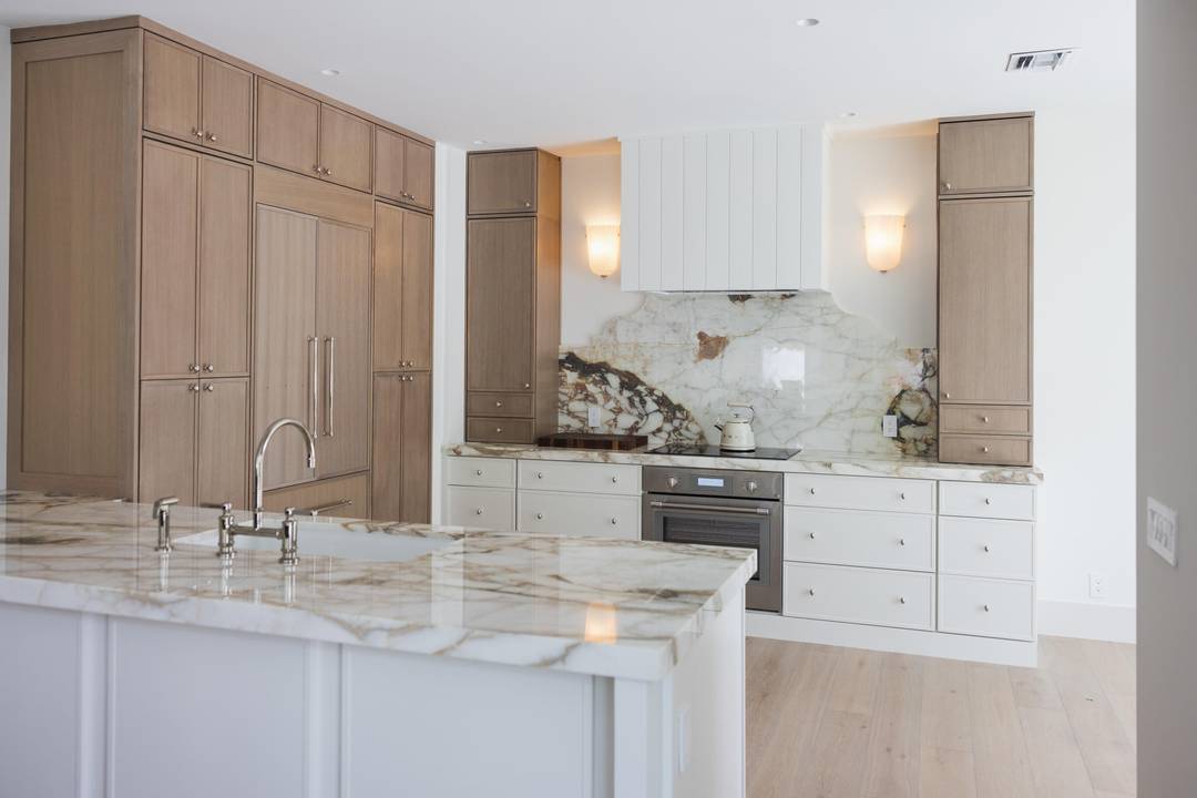 Rarely available first level unit in Pebblewood, offering a completely renovated, sophisticatedly designed residence.