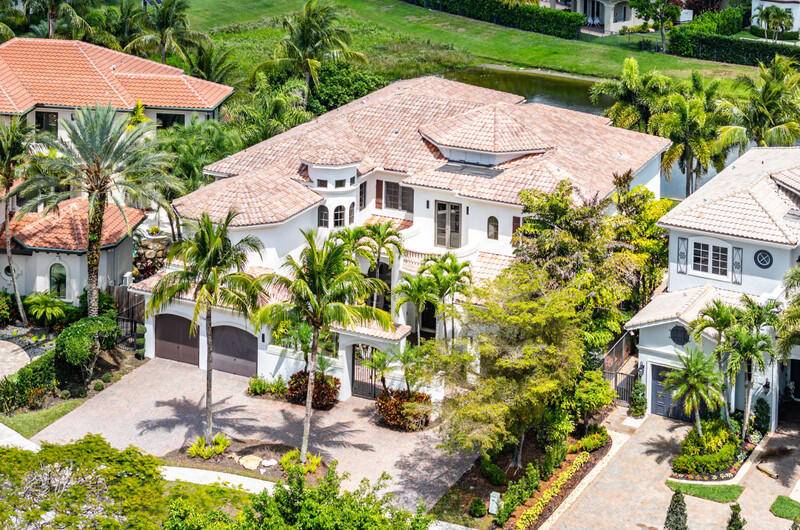 Experience timeless elegance in this sleek, renovated lakefront estate.