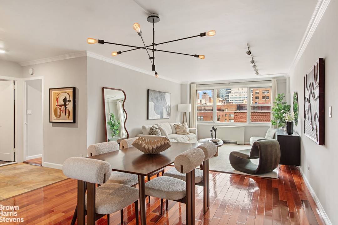 BACK ON MARKET ! This light filled, oversized one bedroom, one bathroom home offers open northern and western exposures with wide city views in a full service building in the ...