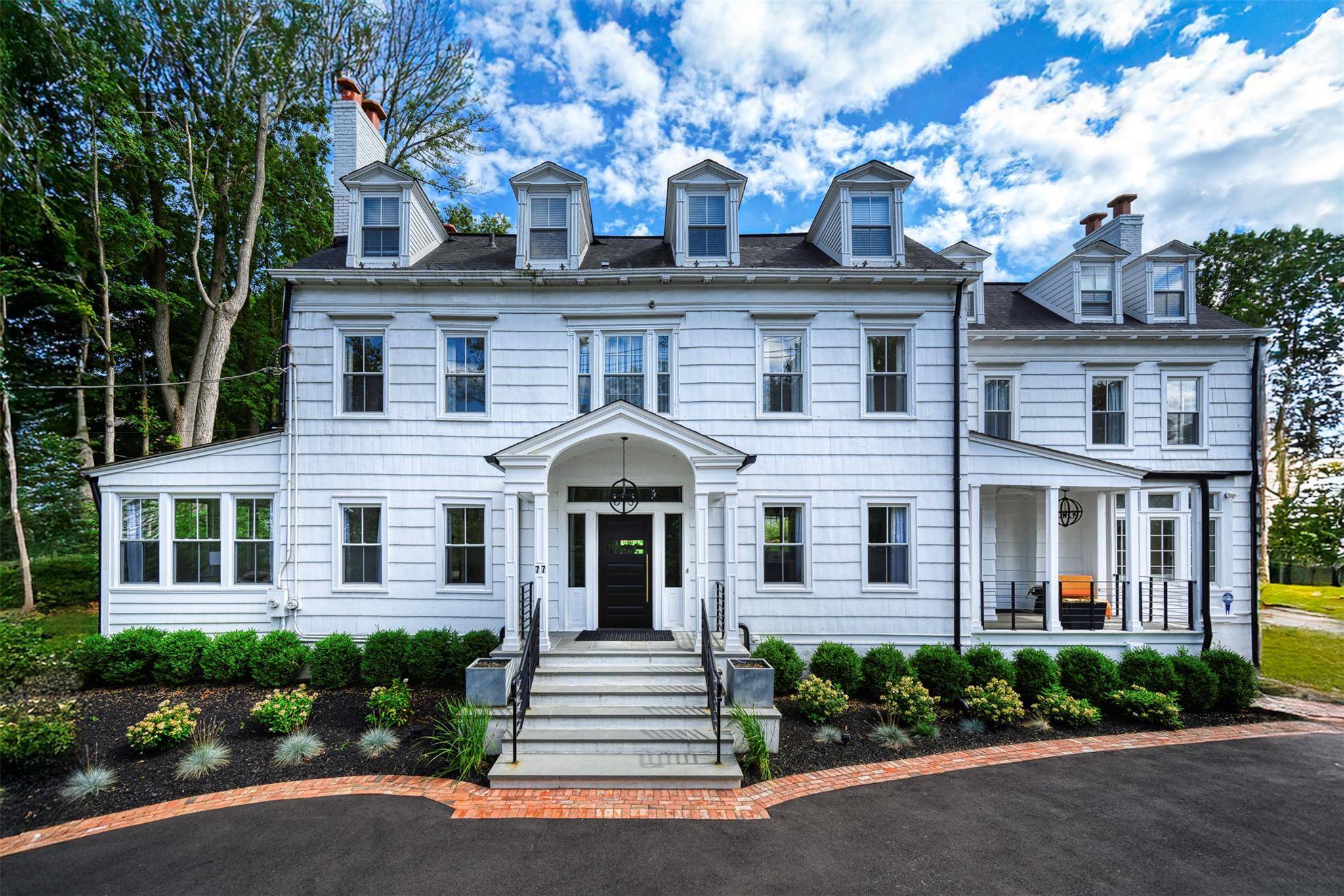 Exquisitely Renovated Historic Estate with Water View.