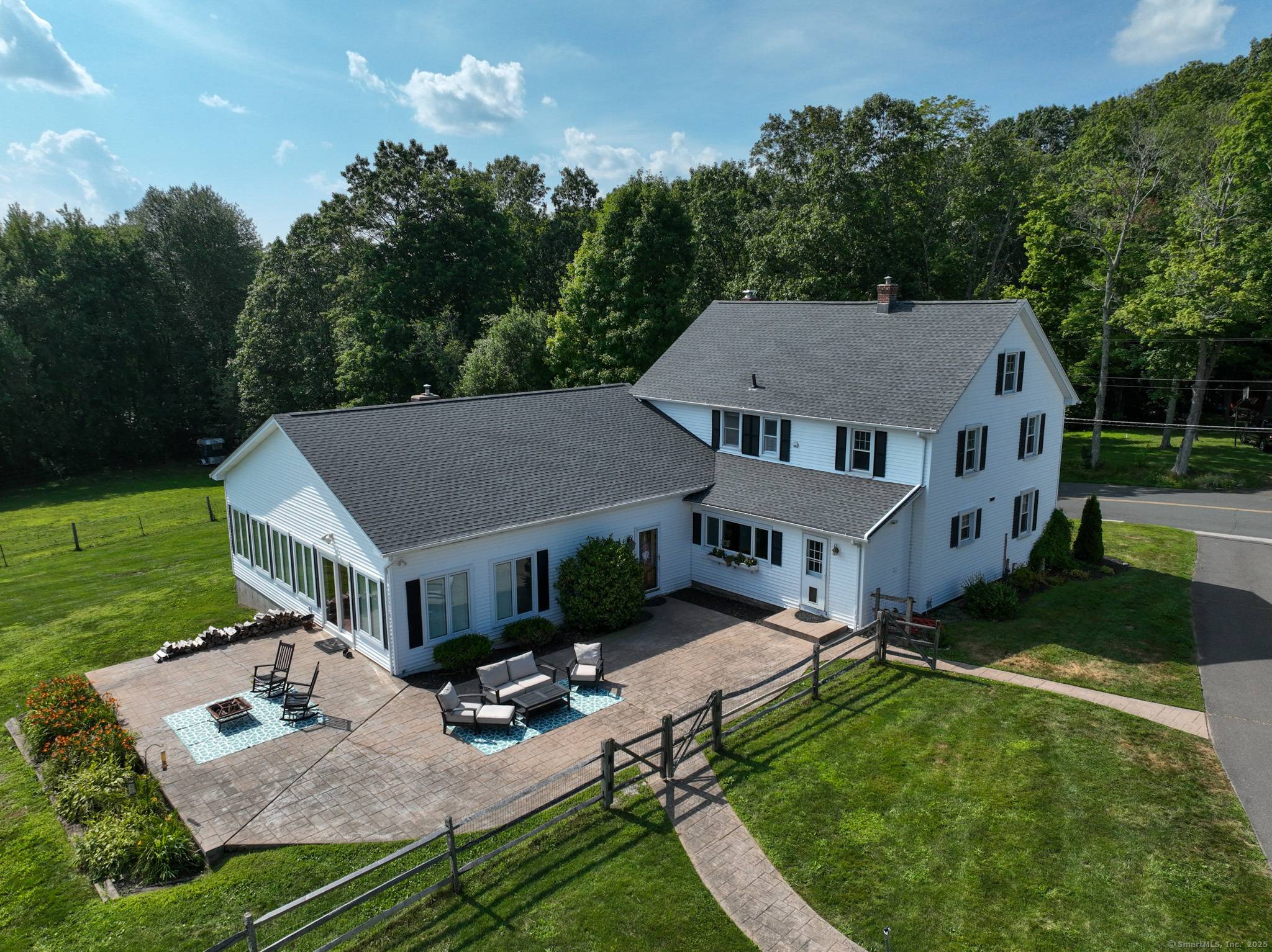 Includes Approved Building Lot Endless Possibilities Await Set on 5 private acres with access to the Bolton Land Trust Trails, this 4 bedroom, 2.