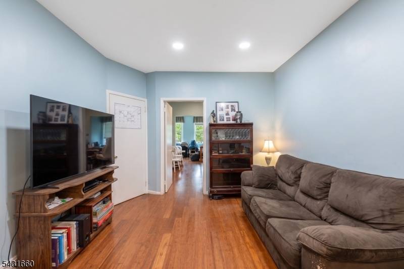 Rare opportunity to own a spacious two family brick home in Jersey City's desirable West Bergen neighborhood.