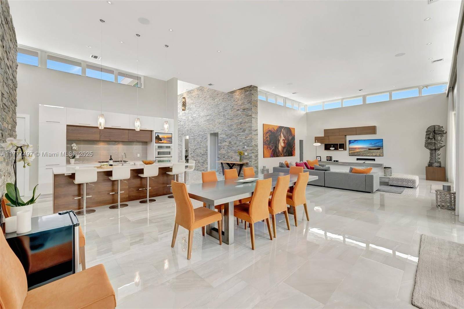 Experience unparalleled luxury in this 2016 ground up constructed architectural gem set on an oversized 15, 000 SF lot in the prestigious enclave of Diplomat Parkway backing to The Shell ...
