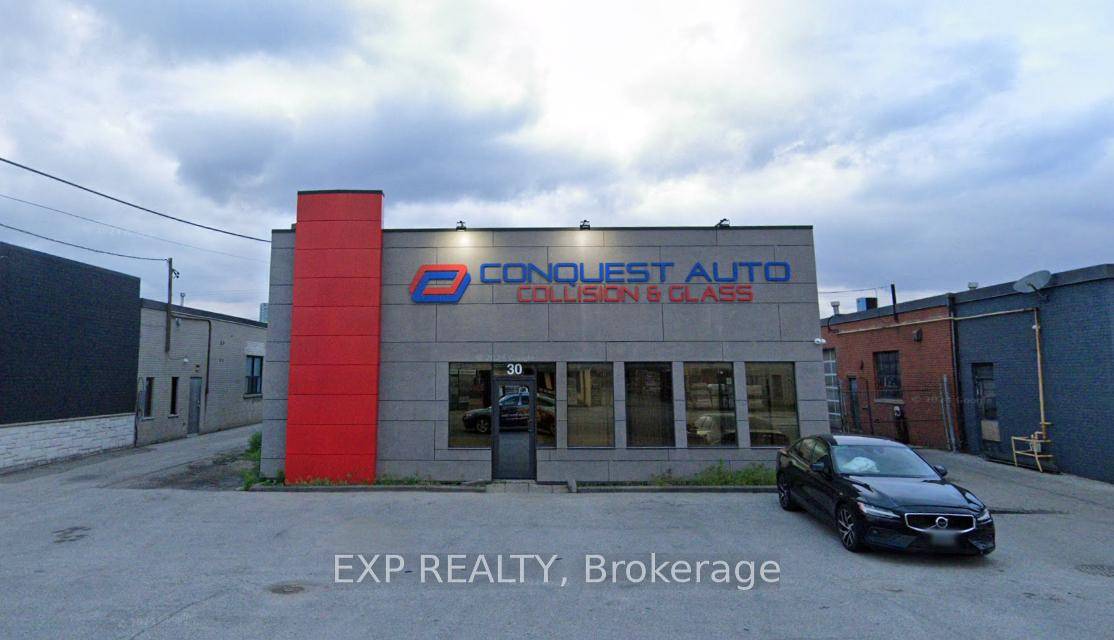 PREMIUM LOCATION 0. 42 acres, very well maintained, freestanding building and Auto Body Business combined for sale.