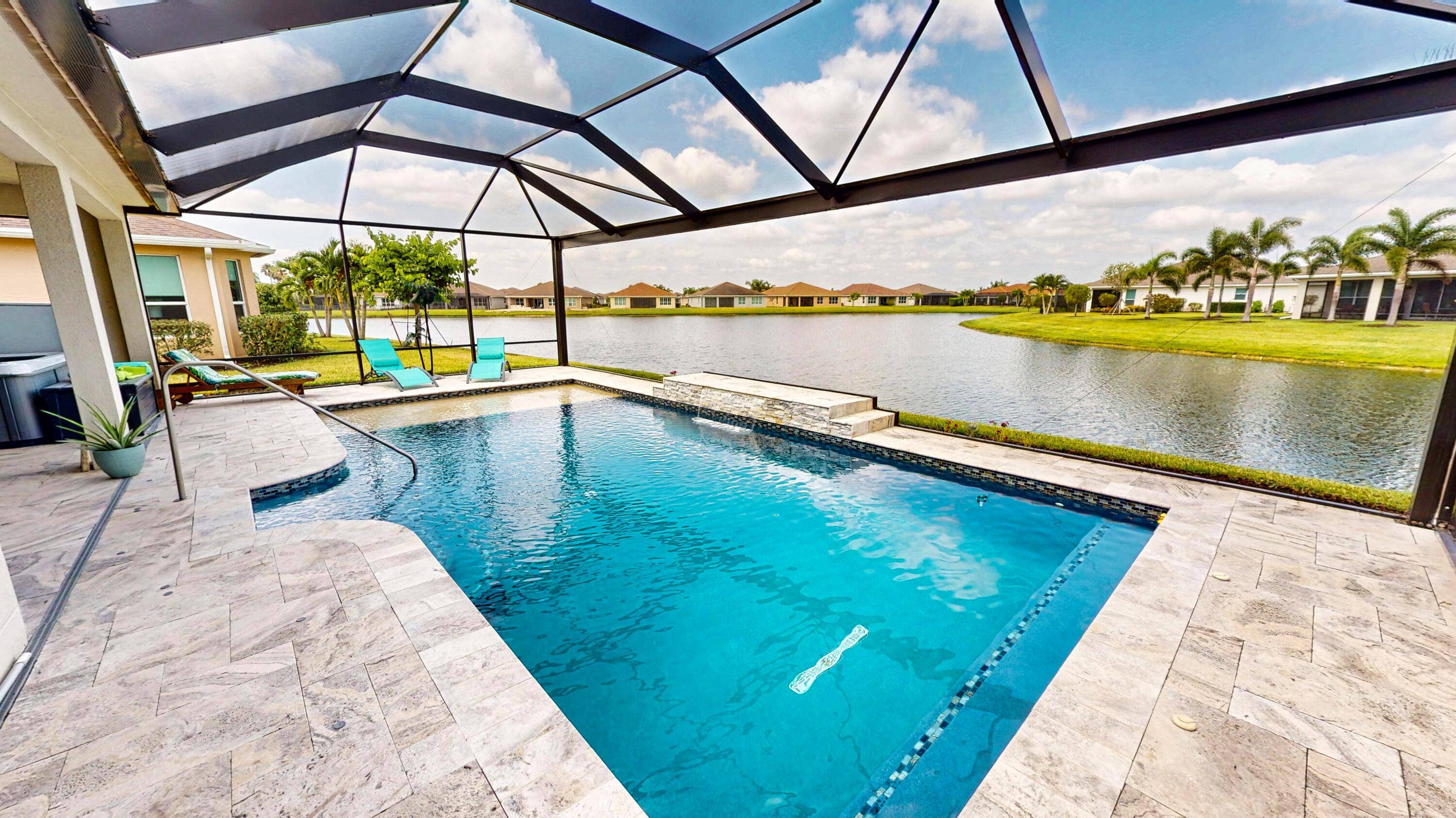 Stunning 2BR Den, 2BA home with breathtaking lake and pool views !