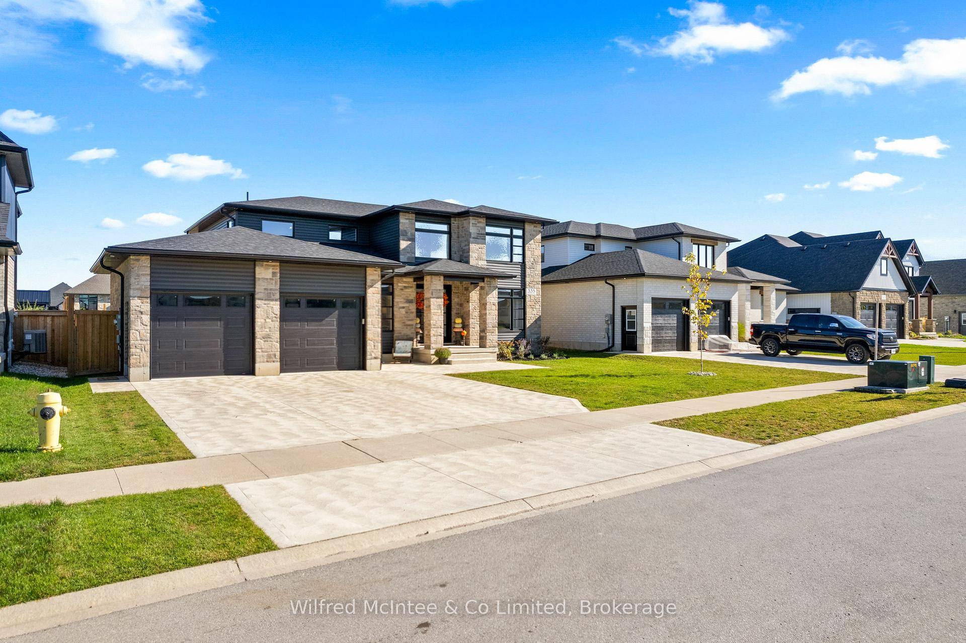 Welcome to 335 Devonshire Road in Port Elgin a 2 year new Bogdanovic built home that blends timeless two storey design with modern upgrades.