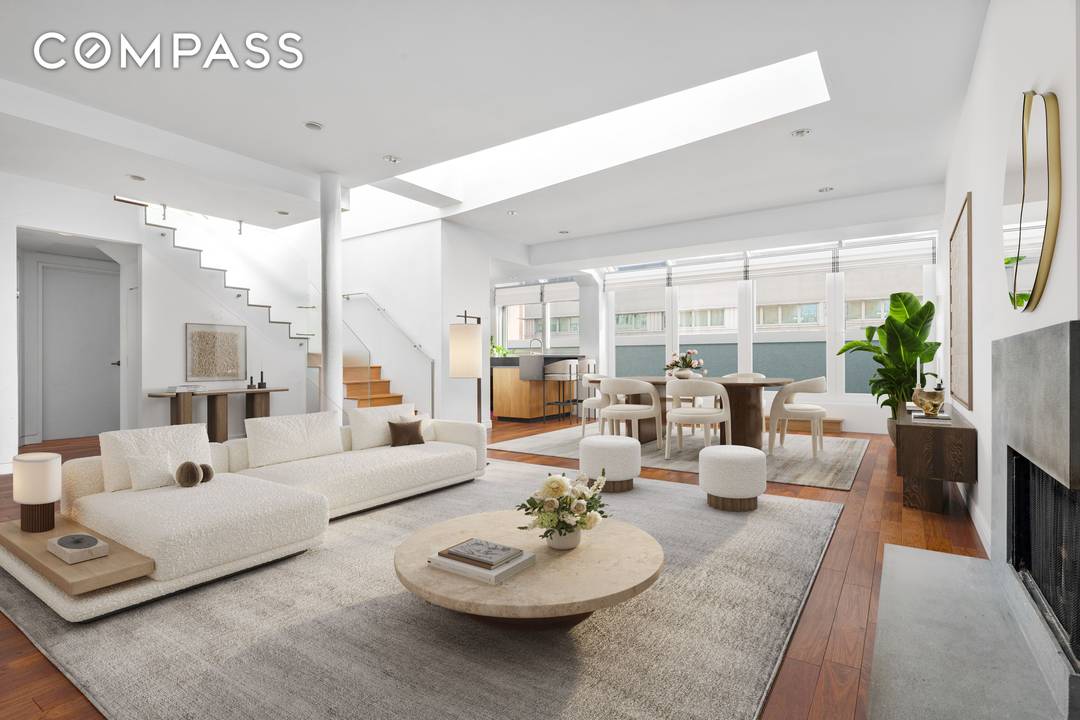 Experience modern loft living at its finest in this exceptional two bedroom, two bathroom duplex penthouse with two private terraces and sweeping skyline views in the heart of Tribeca.