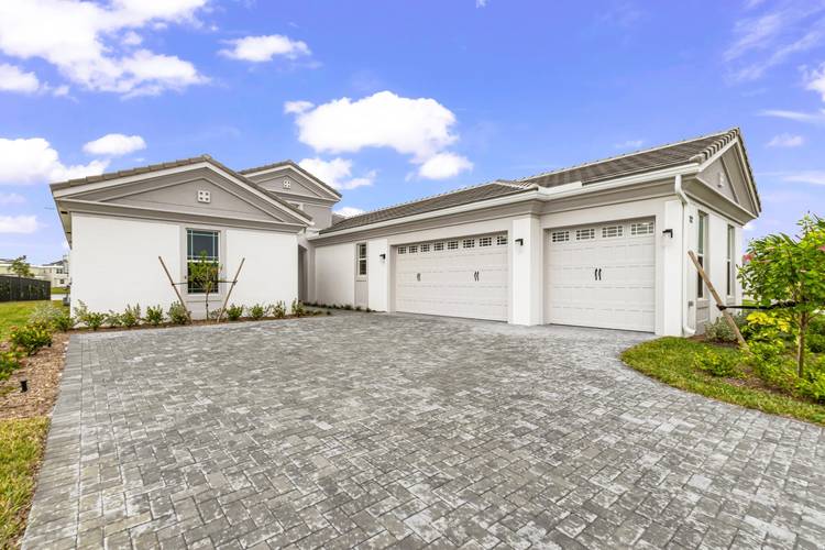 Welcome to this exceptional single story retreat in the heart of Westlake, FL, a thriving, resort style community where everyday living feels like a vacation.