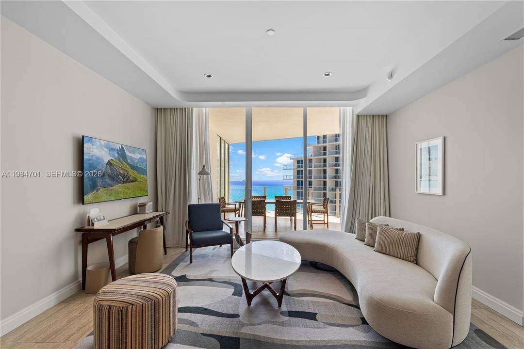 Rising above the Atlantic shoreline at the Four Seasons Private Residences, this exceptional 1 bedroom, 2 bathroom oceanfront retreat offers 1, 458 SF of refined interiors and 1, 958 total ...