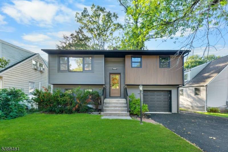 Welcome to your forever home, a beautiful FULLY RENOVATED bi level residence.