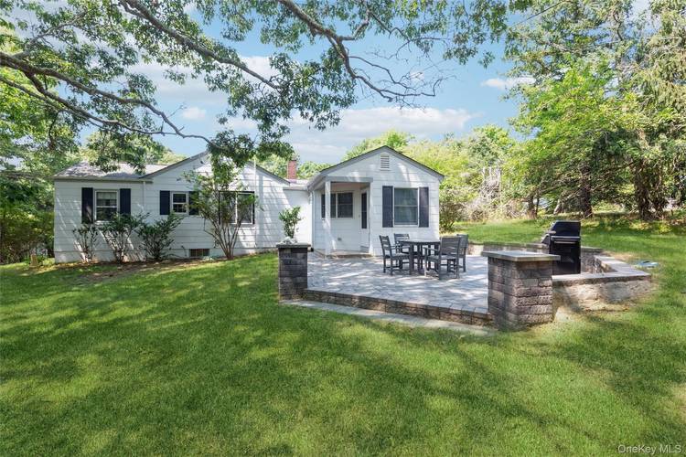 Enjoy a carefree Hampton Bays summer in this private 2 bedroom, 2 bath home set on a spacious, secluded lot just minutes from ocean beaches, waterfront dining, shopping, and local ...