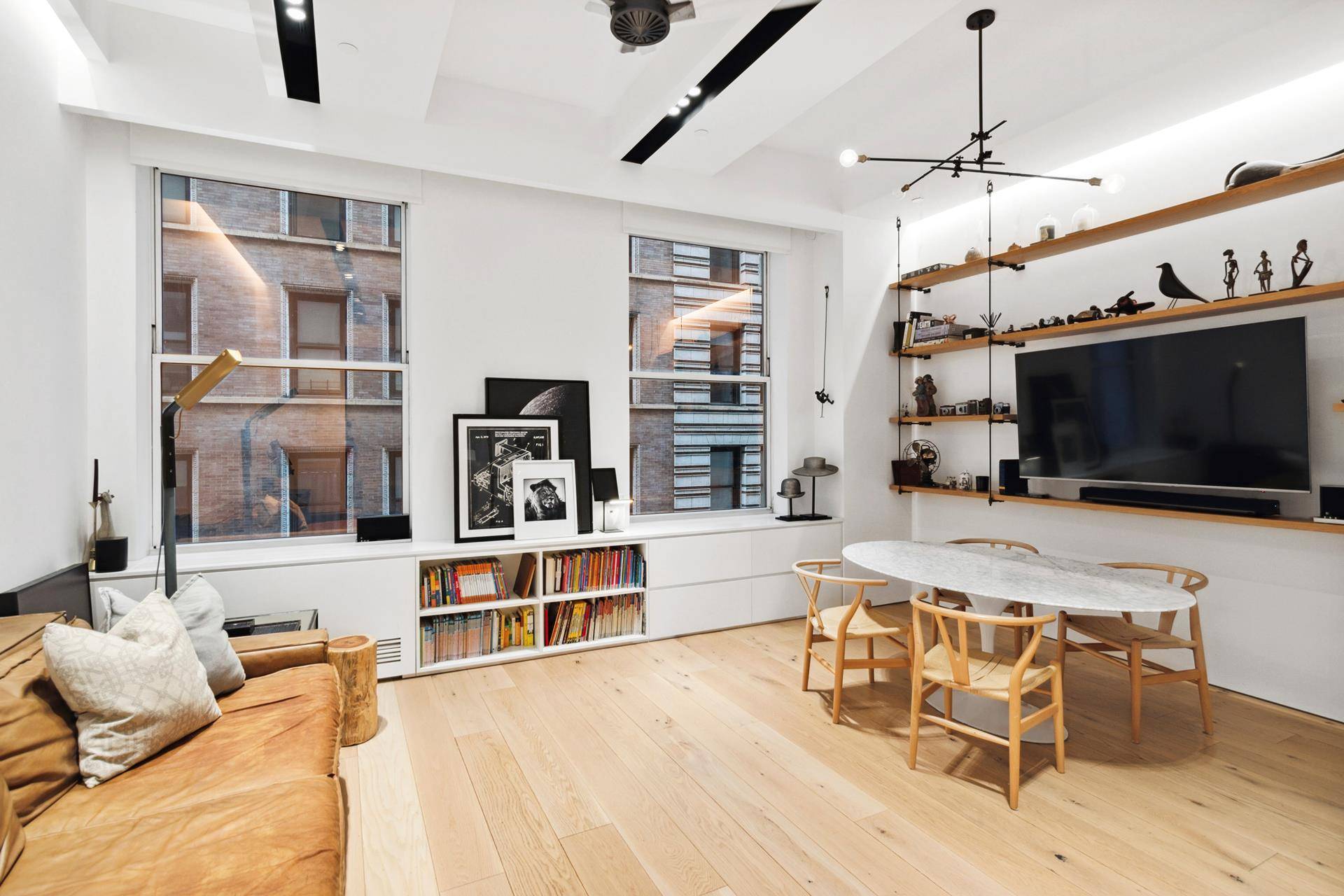 Welcome to a luxurious, architecturally renovated 1 bedroom apartment with a dedicated home office at DOWNTOWN by Philippe Starck, the building that put FiDi on the residential map.