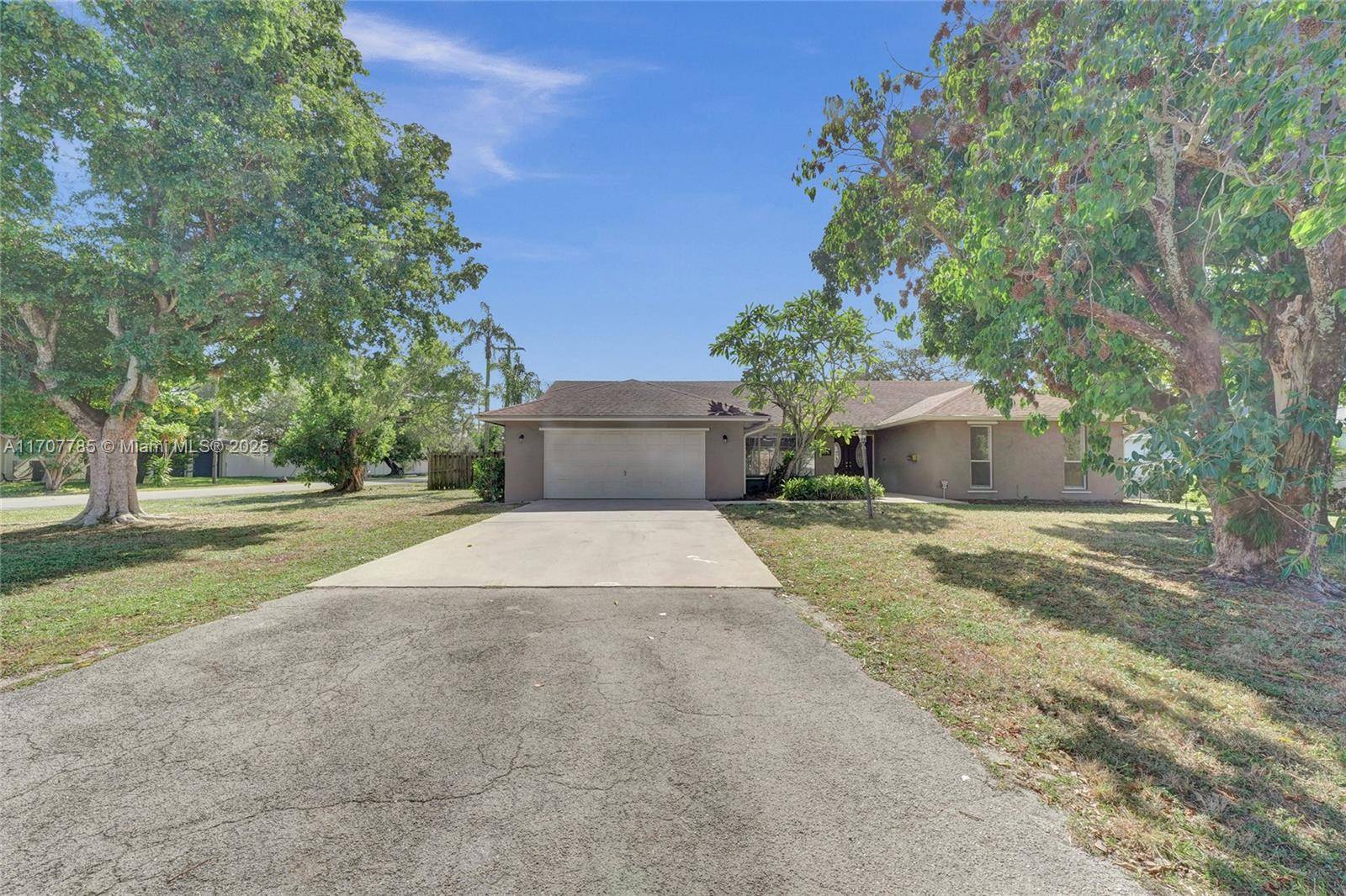 Beautiful 4 bdrm, 3 bathroom home, 2 car garage, and a driveway accommodating up to 4 additional vehicles and sitting on an expansive 15, 086 sq.