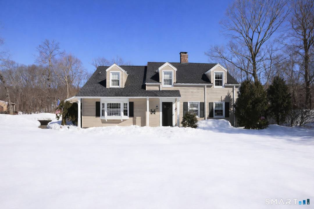 Welcome to this absolutely charming Cape Cod style home, perfectly sited on a picturesque lot w over 2 acres in one of Danbury's most desirable locations.