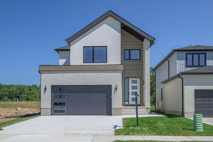 RAVINE WOODED LOT close to park and down the street from new state of the art public school !