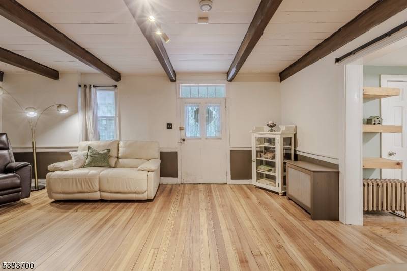 Step into timeless charm with this beautifully maintained 3 bedroom 1 BR on1st floor, 2 bath 1st floor installed last year home.