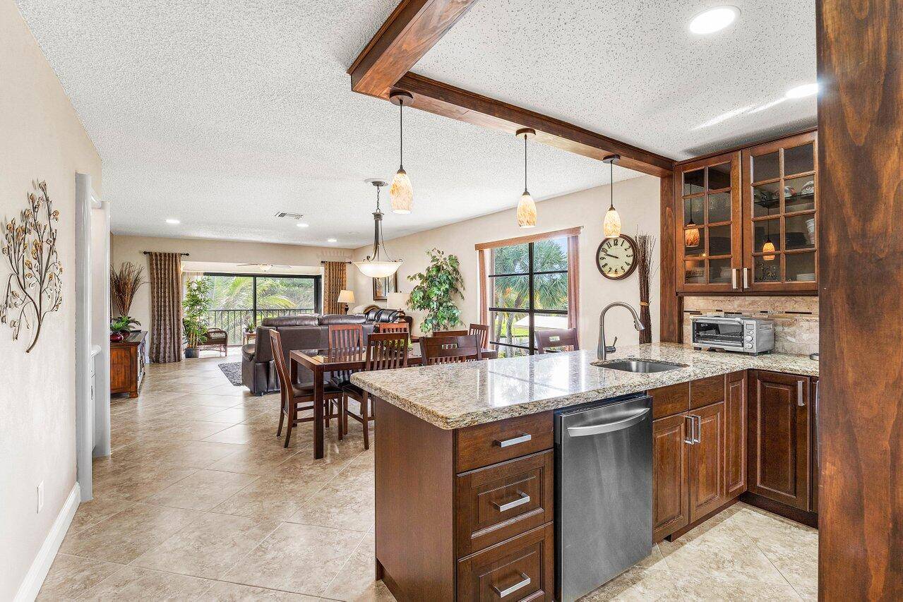 Discover this serene and quiet fully furnished and turnkey home in Boca Lago.