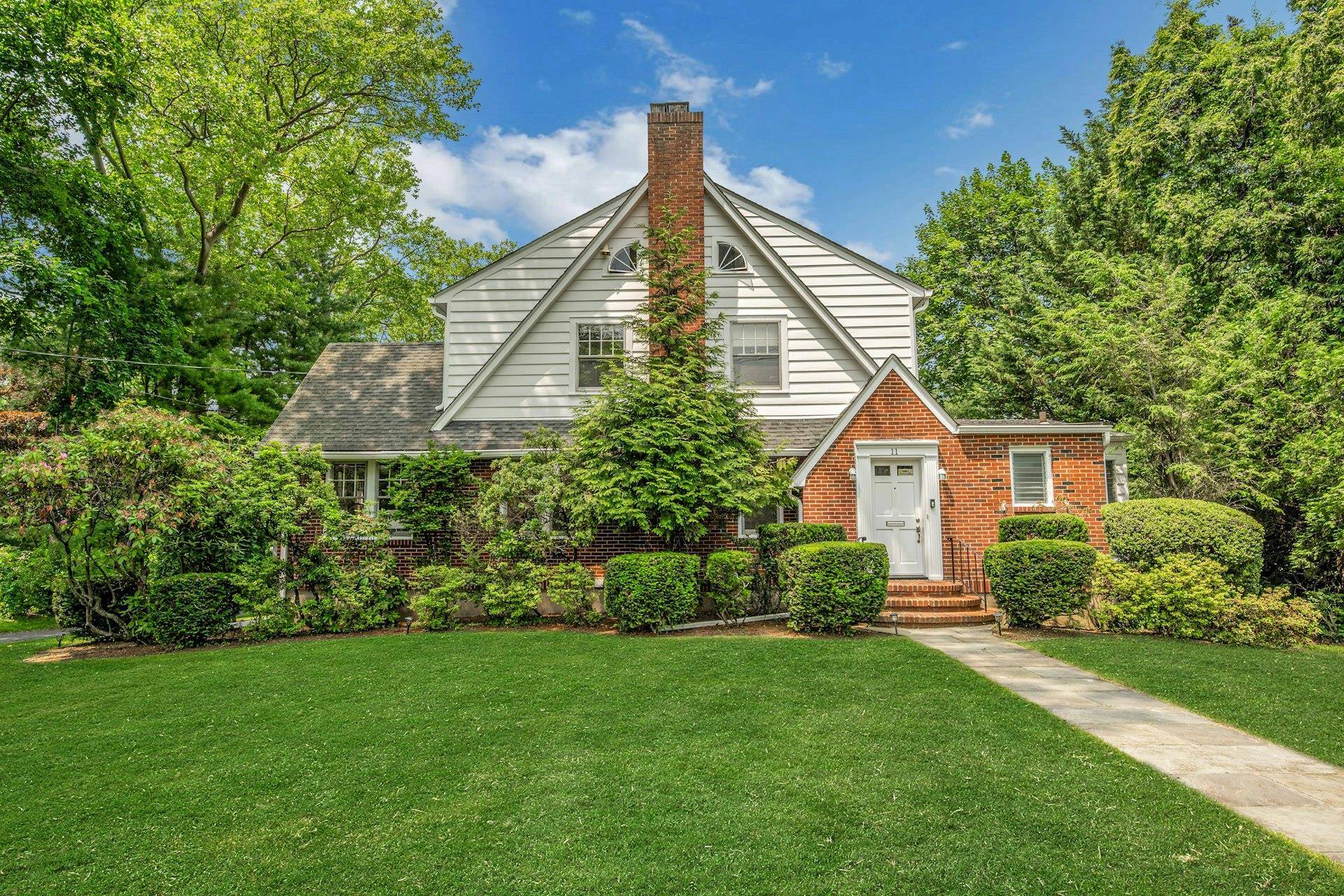 Welcome to this classic Tudor style home, nestled on over half an acre in the desirable Gedney Farms neighborhood.