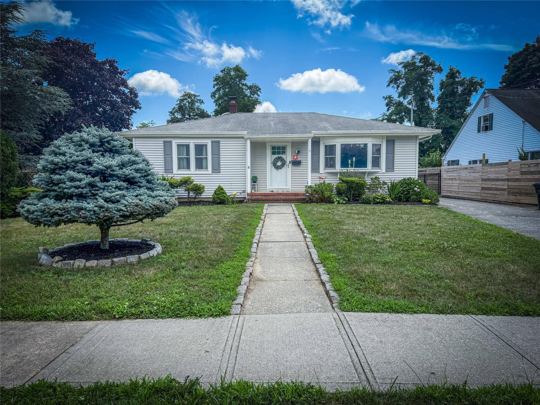 Charming Cottage tucked away on a quiet dead end street just steps away from downtown Riverhead.