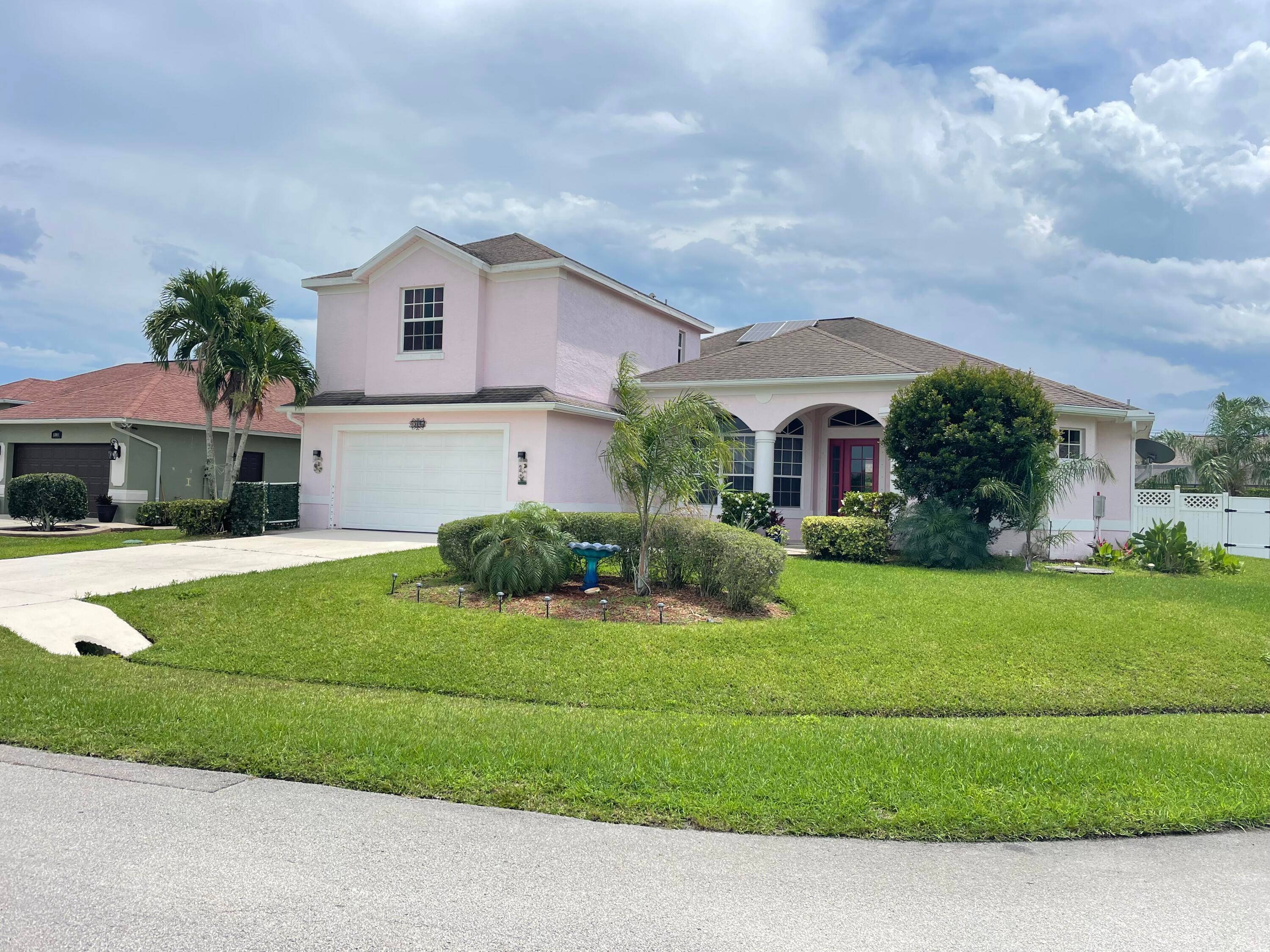 This meticulously maintained solar powered home features 5 bedrooms and 4 full bathrooms.
