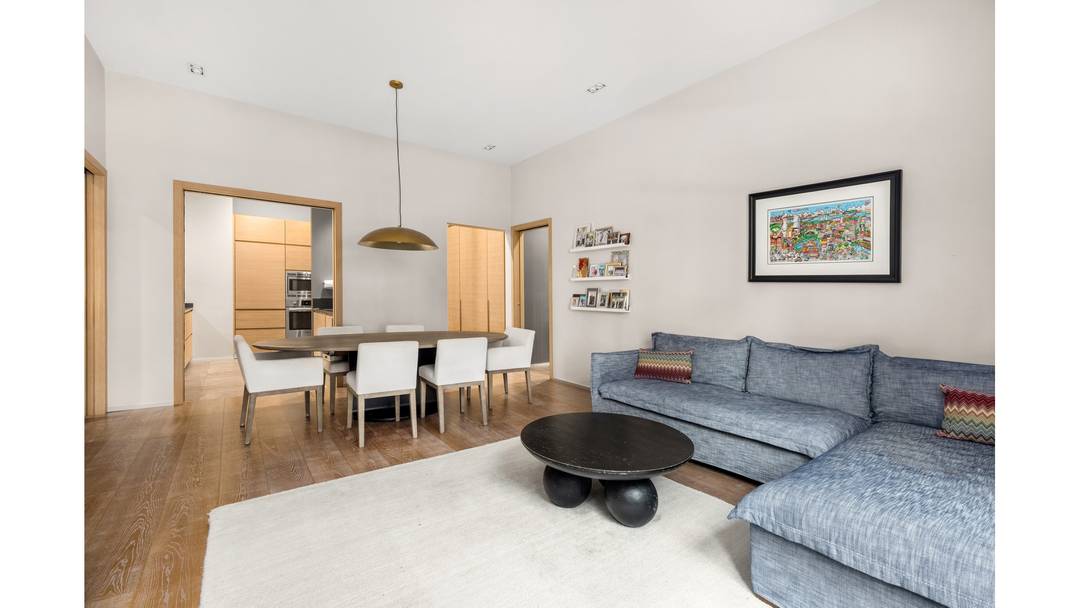 Located in the landmarked Cary Building, this 1, 617 square foot, 2 bedroom, 3 bath residence pairs authentic prewar architecture with clean, contemporary design.