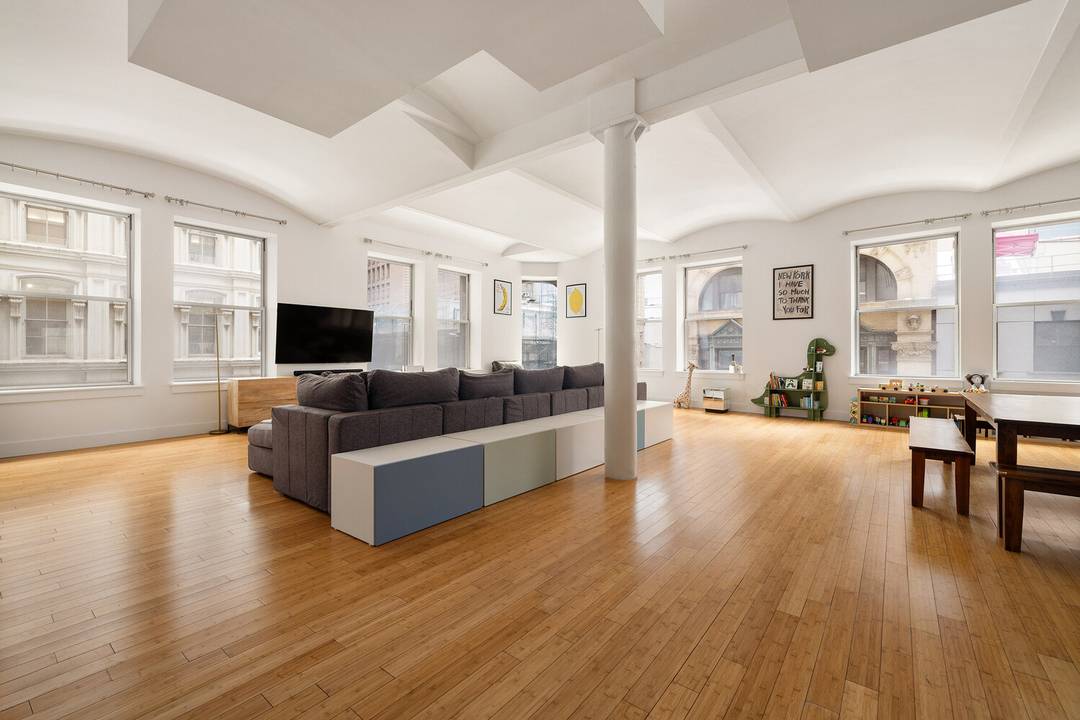 A luminous corner loft of exceptional scale in the Financial District.