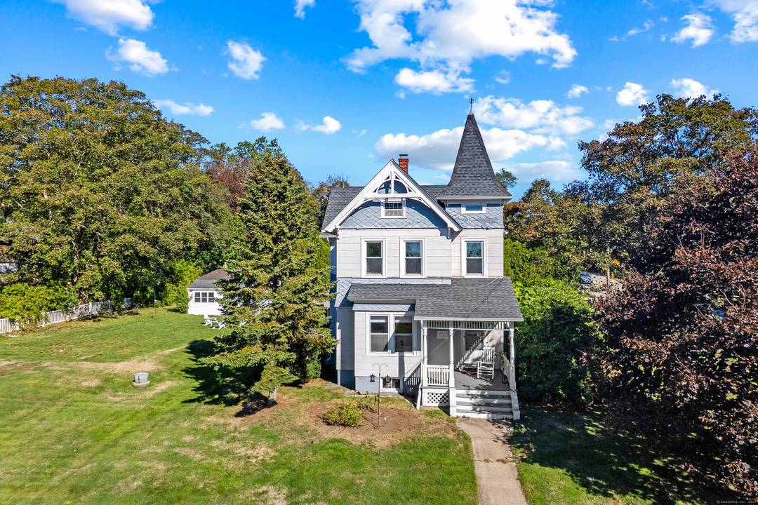 Charming Victorian home offers timeless appeal and spacious living on over half an acre of land.