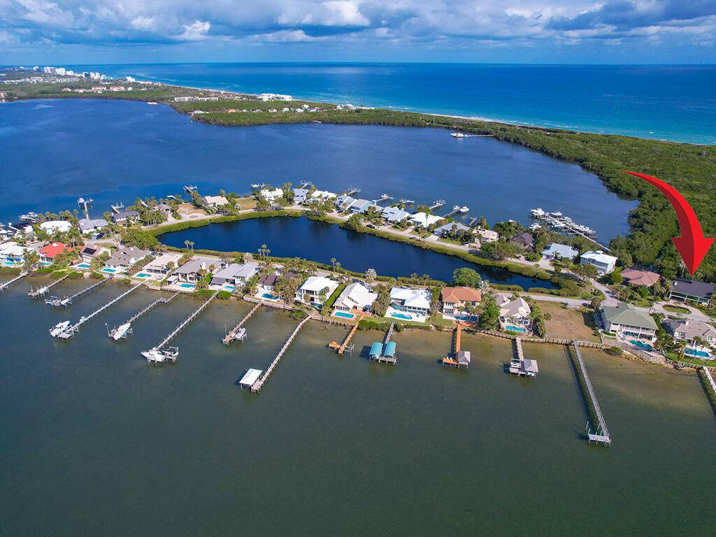 Located in the highly sought after, gated waterfront community of Joe's Point on Hutchinson Island, this exquisite Key West style home offers an exceptional lifestyle blending luxury, comfort, and coastal ...
