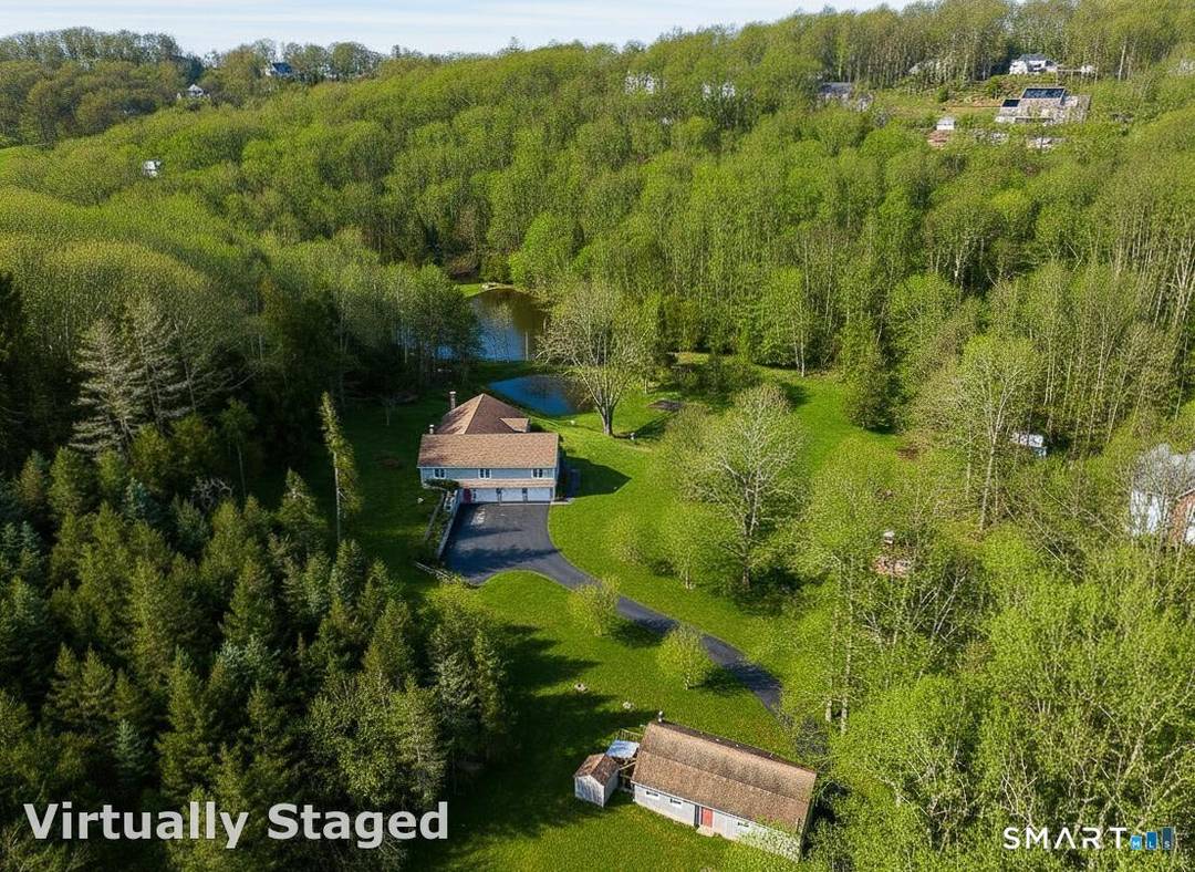 An incredible and rare opportunity awaits with this extraordinary 28 acre parcel, offering unmatched privacy, serenity, and timeless New England charm.