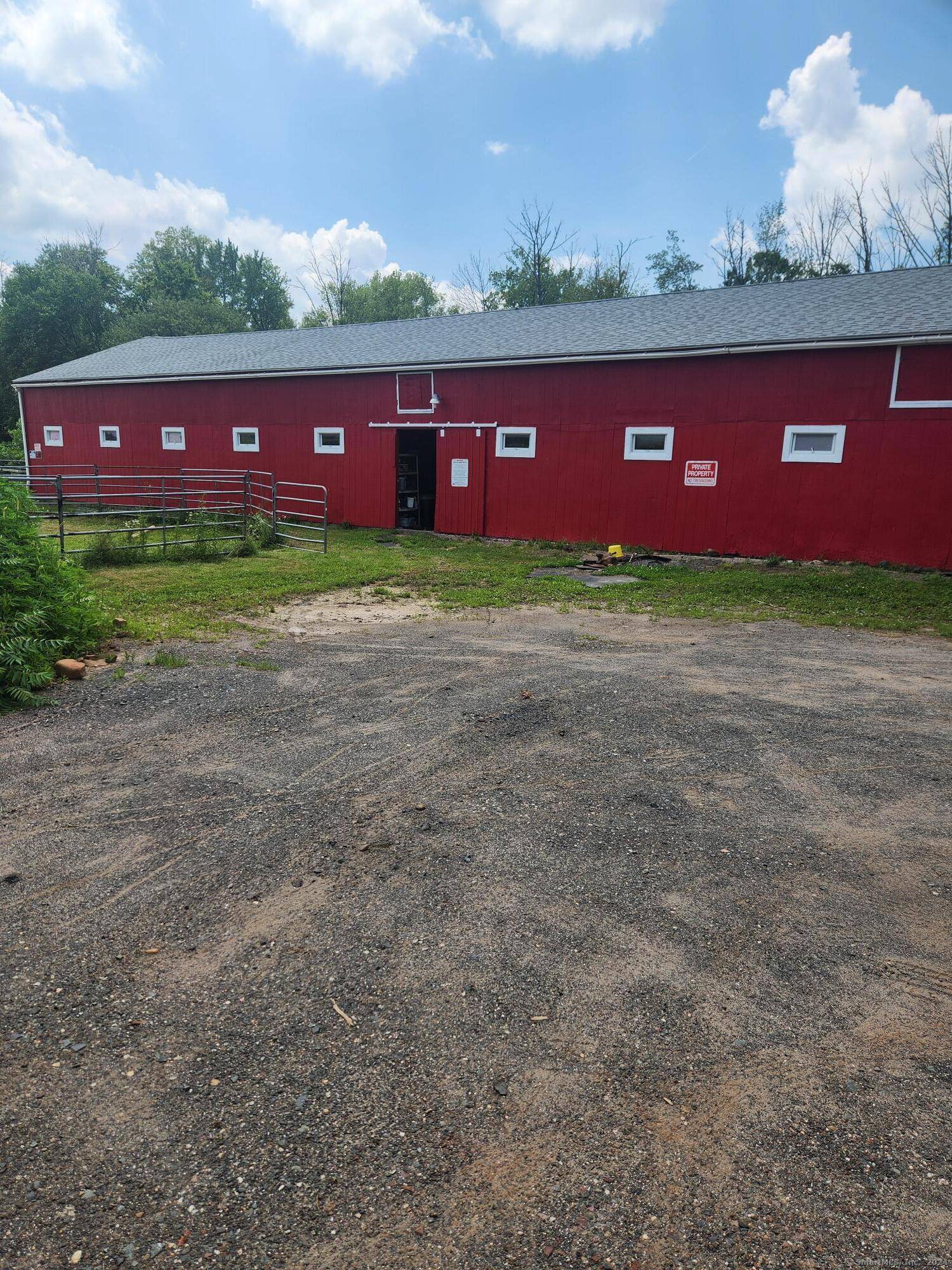 Great 59. 2 acre piece of land on the back side of the Airport.