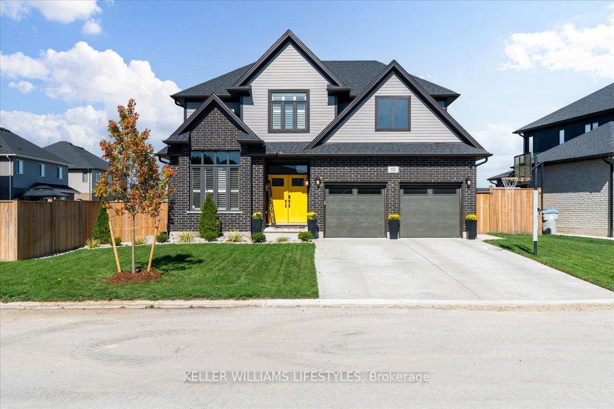 Built in 2021 by Waverly Homes, this handsome 4 bedroom, 2.