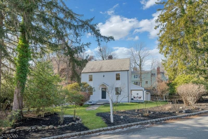 Gorgeous fully renovated colonial home with scattered seasonal views of the NYC skyline.